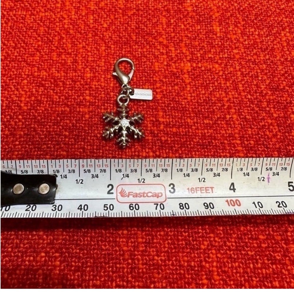 Coach Silver Snowflake Charm on Lobster Clasp